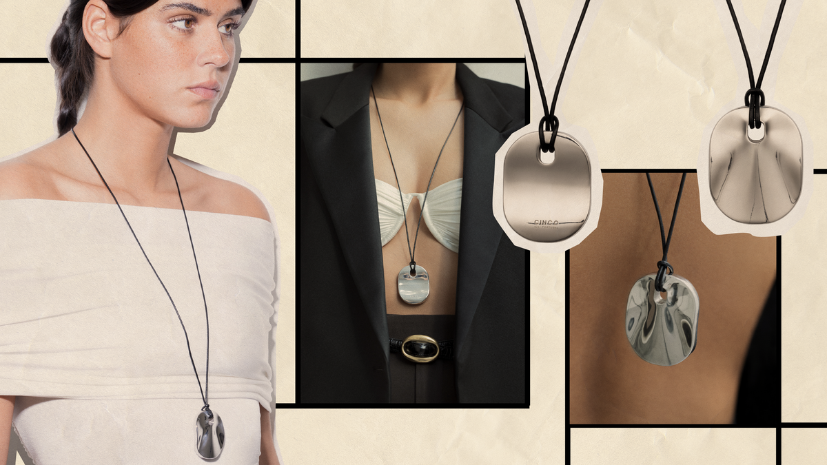 Elegant model wearing a bold long necklace for resilience, showcasing CINCO's unique jewelry design.