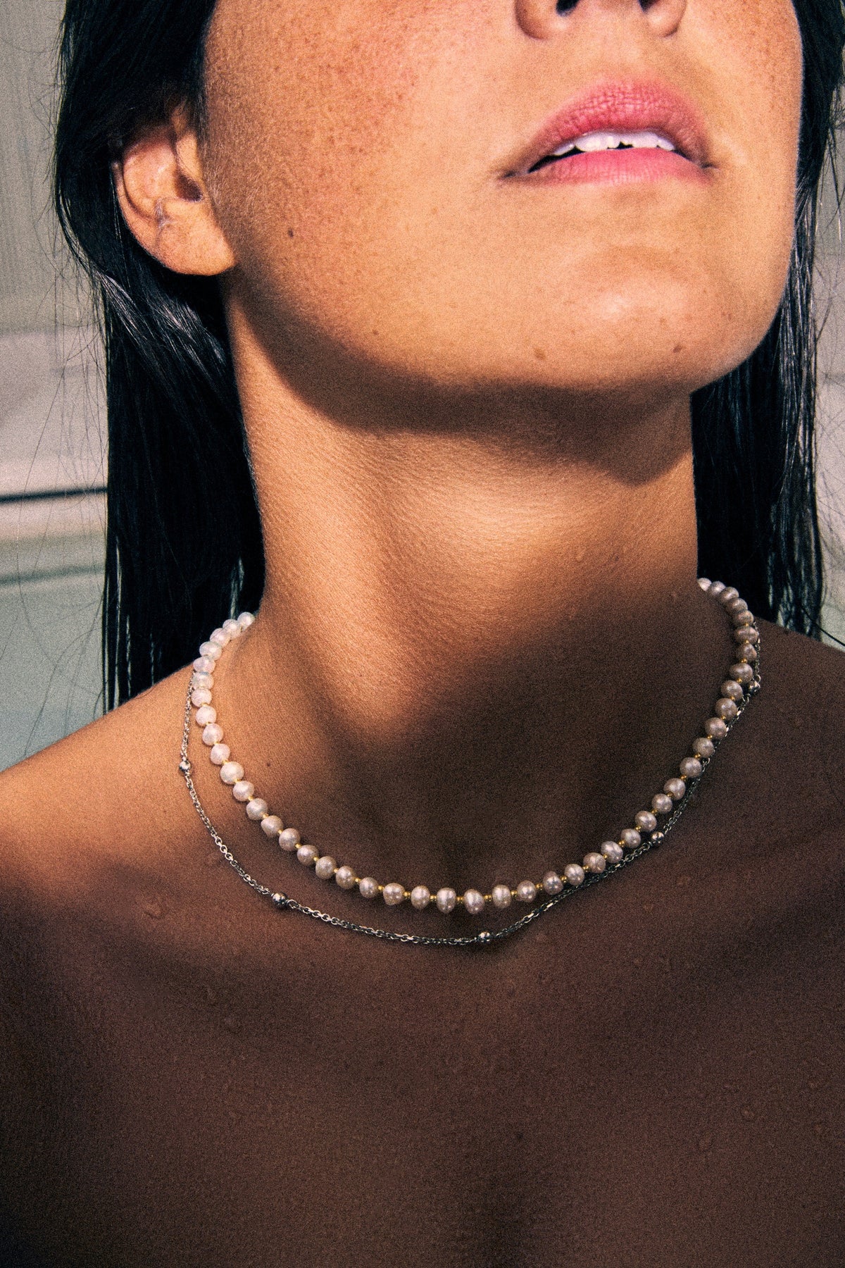 layered necklace styling tips with elegant pearls and chains