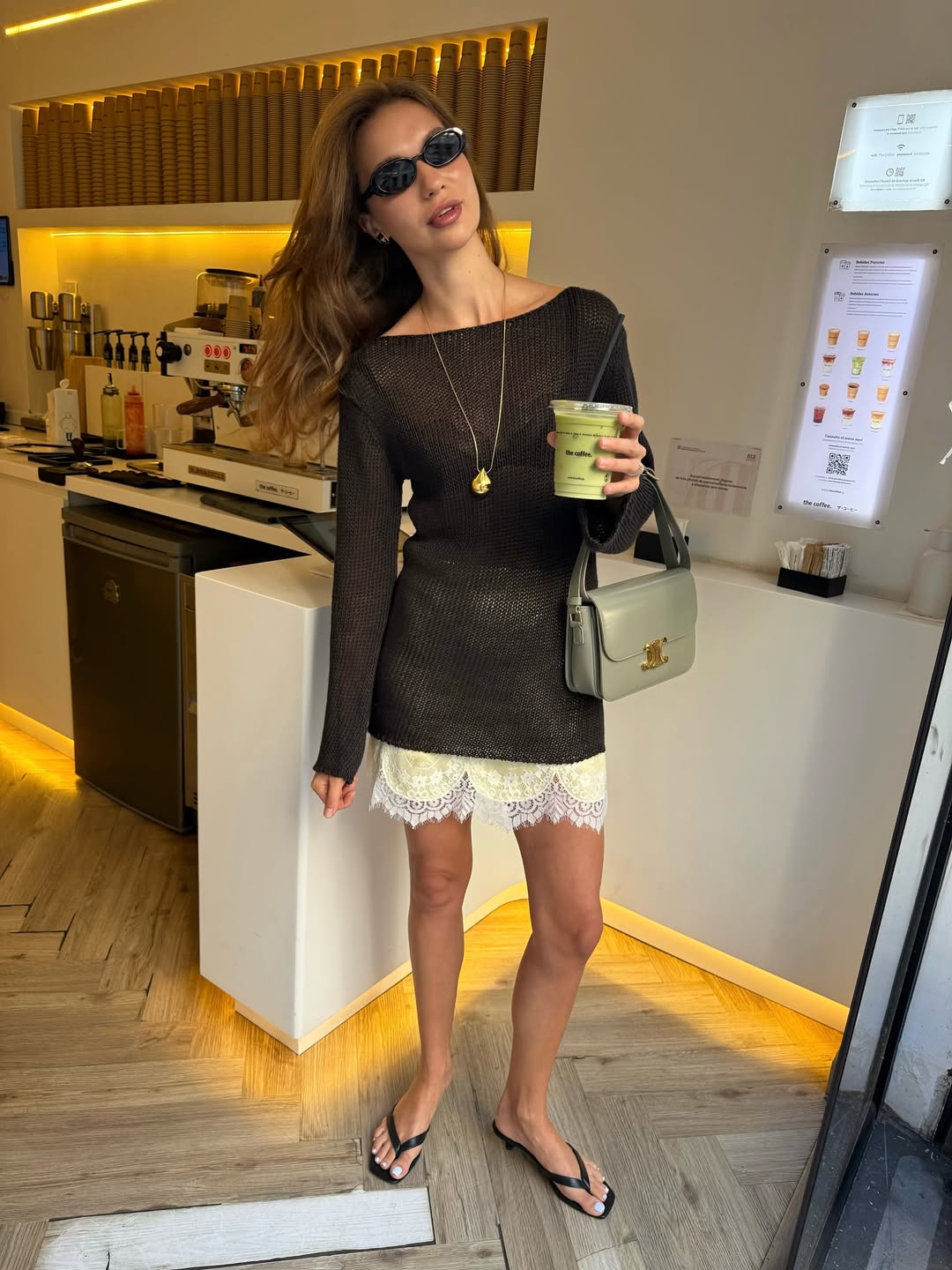 model wearing allegra necklace in gold