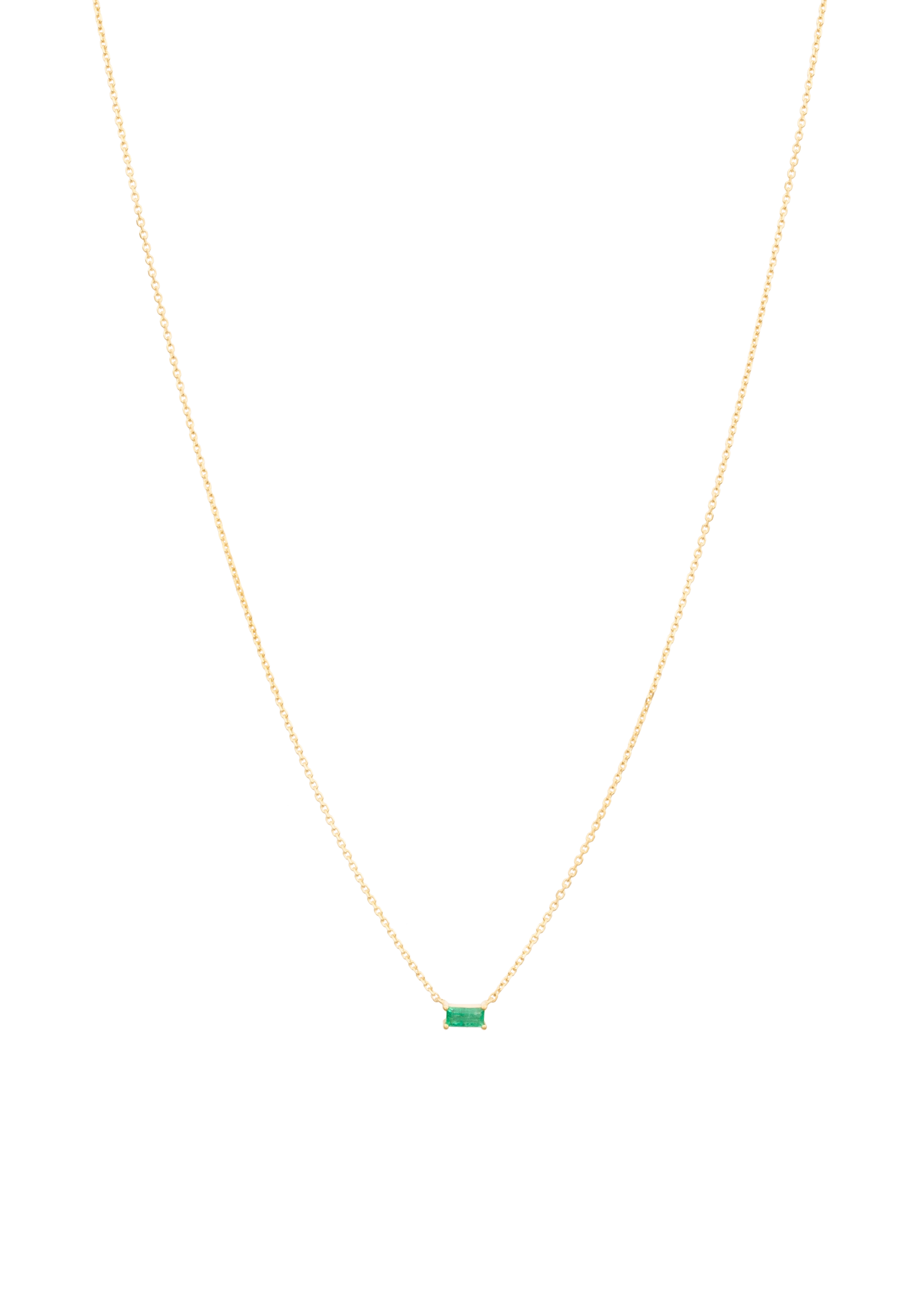 Gold necklace with a green gemstone pendant on a white background