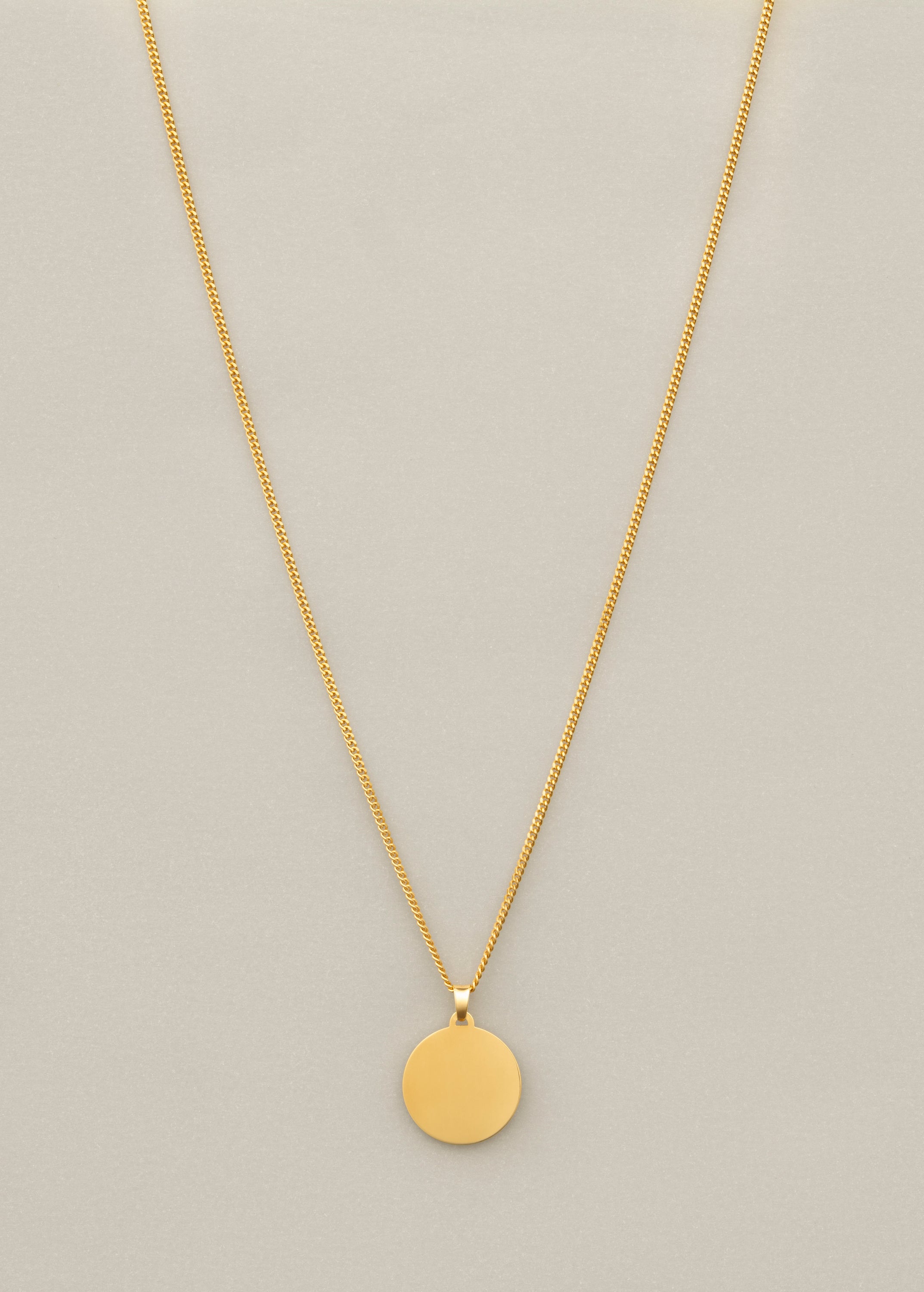 mad necklace in gold